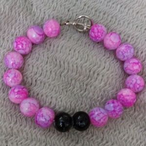 Pink and black childs bracelet